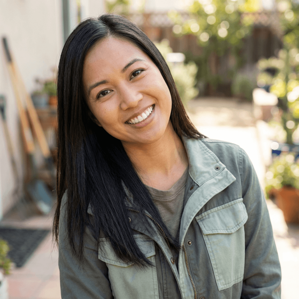 Jordan Lee smiling in a bright modern space